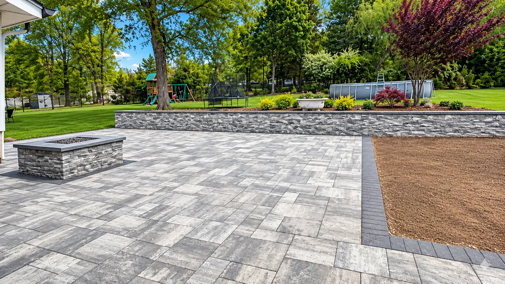 Tiered segmental block retaining wall with plantings in Central New Jersey